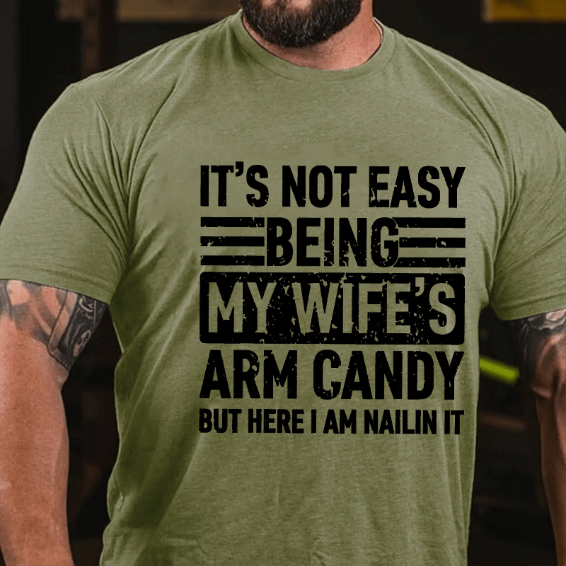 Maturelion It's Not Easy Being My Wife's Arm Candy But Here I'm Nailing It Cotton T-shirt