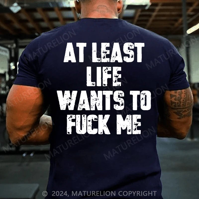 Maturelion At Least Life Wants To Fuck Me Cotton T-shirt