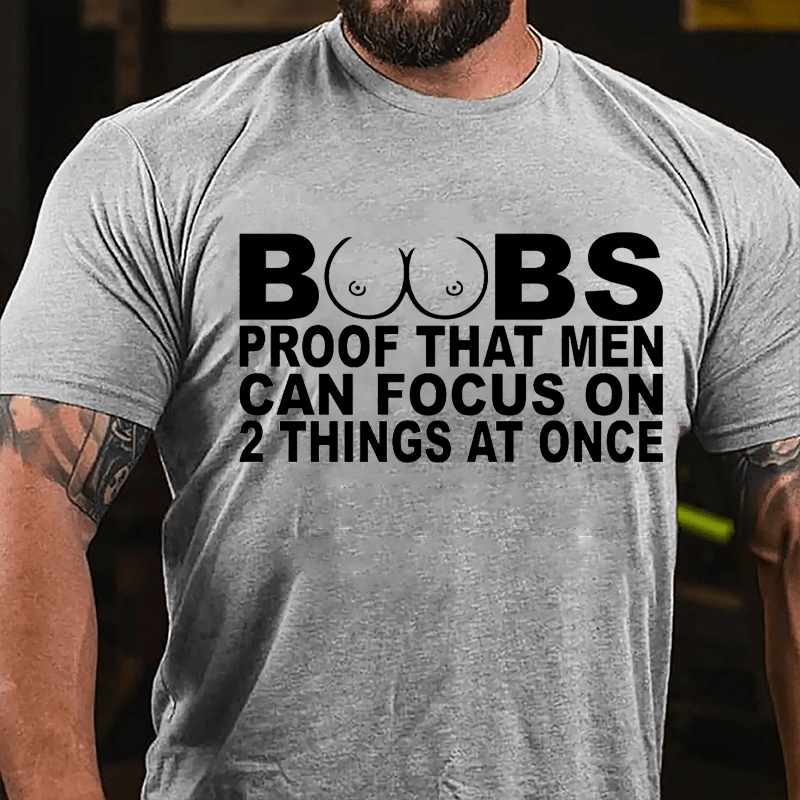 Boobs: Proof That Men Can Focus On 2 Things At Once Men's Cotton T-shirt