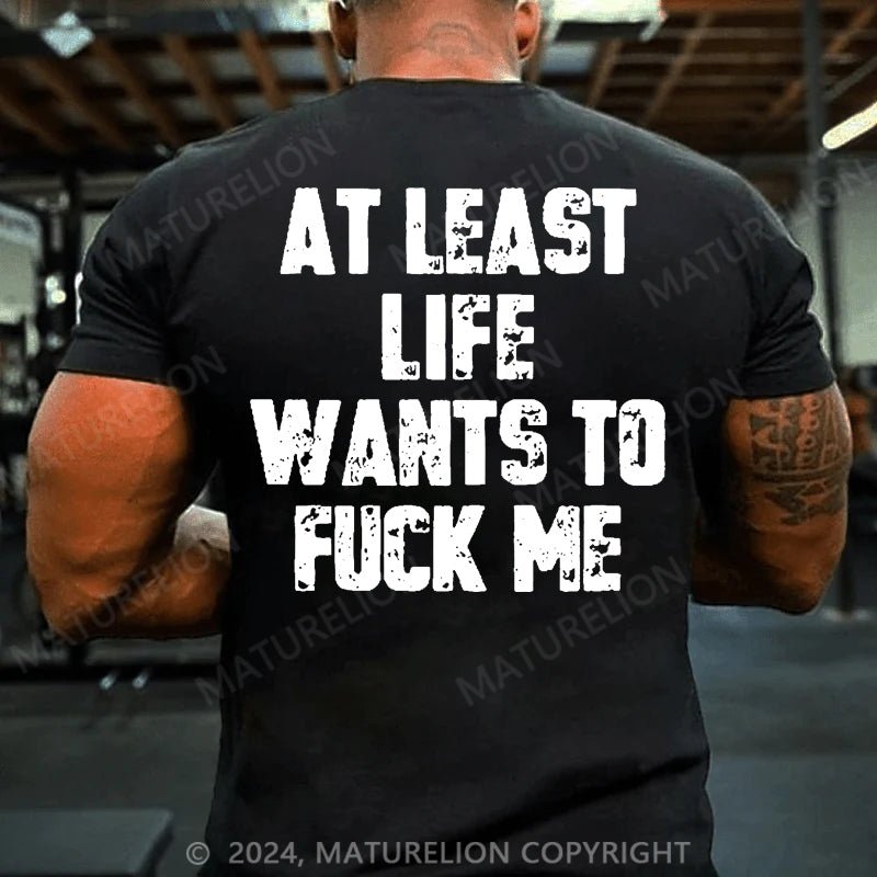 Maturelion At Least Life Wants To Fuck Me Cotton T-shirt