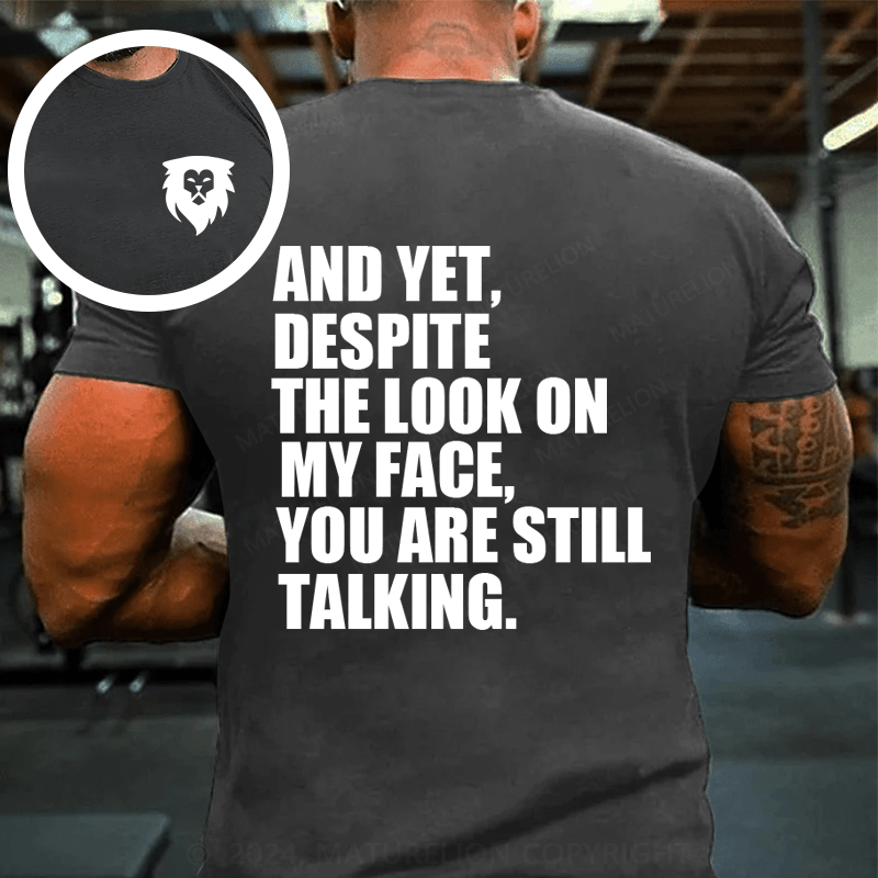 Maturelion Yet Despite The Look On My Face You're Talking Cotton T-Shirt