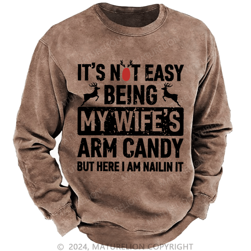 Maturelion Christmas Sweatshirt It's Not Easy Being My Wife's Arm Candy But Here I'm Nailing It Custom Sweatshirt