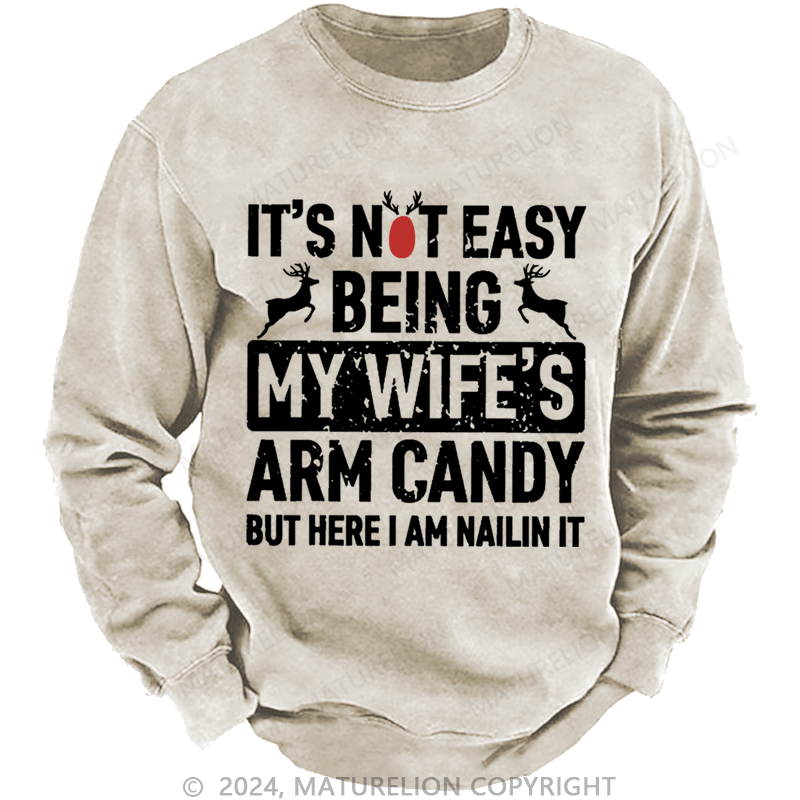 Maturelion Christmas Sweatshirt It's Not Easy Being My Wife's Arm Candy But Here I'm Nailing It Custom Sweatshirt