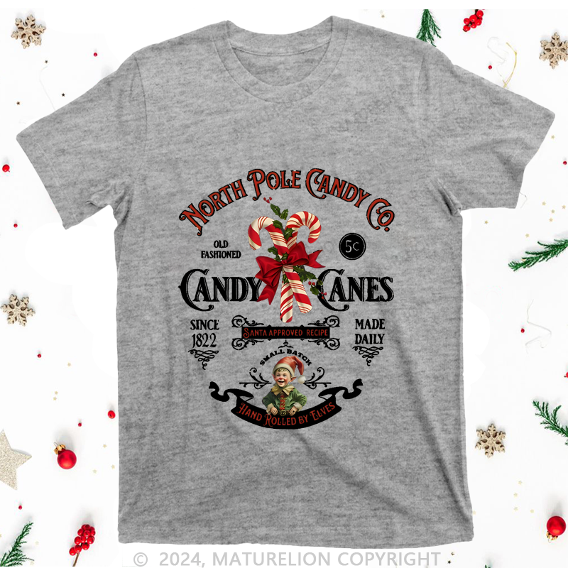 Maturelion Christmas T-Shirt North Pole Candy Women T-Shirt