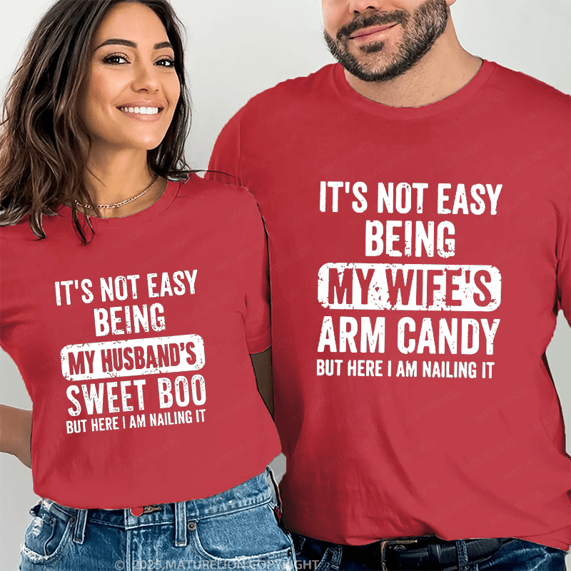 Maturelion It's Not Easy Being My Wife's Arm Candy But Here I Am Nailing It Couple T-Shirt