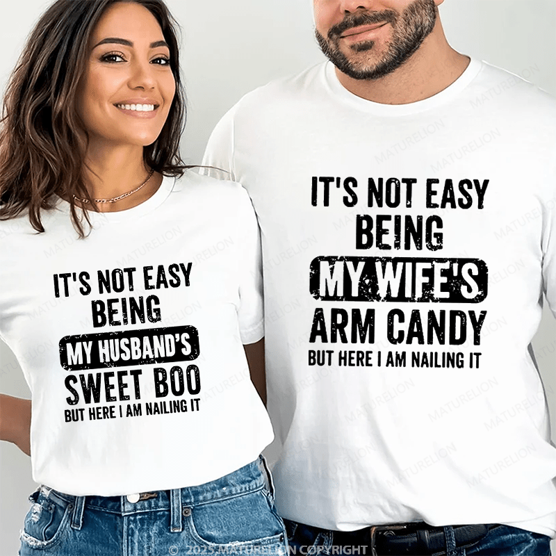 Maturelion It's Not Easy Being My Wife's Arm Candy But Here I Am Nailing It Couple T-Shirt