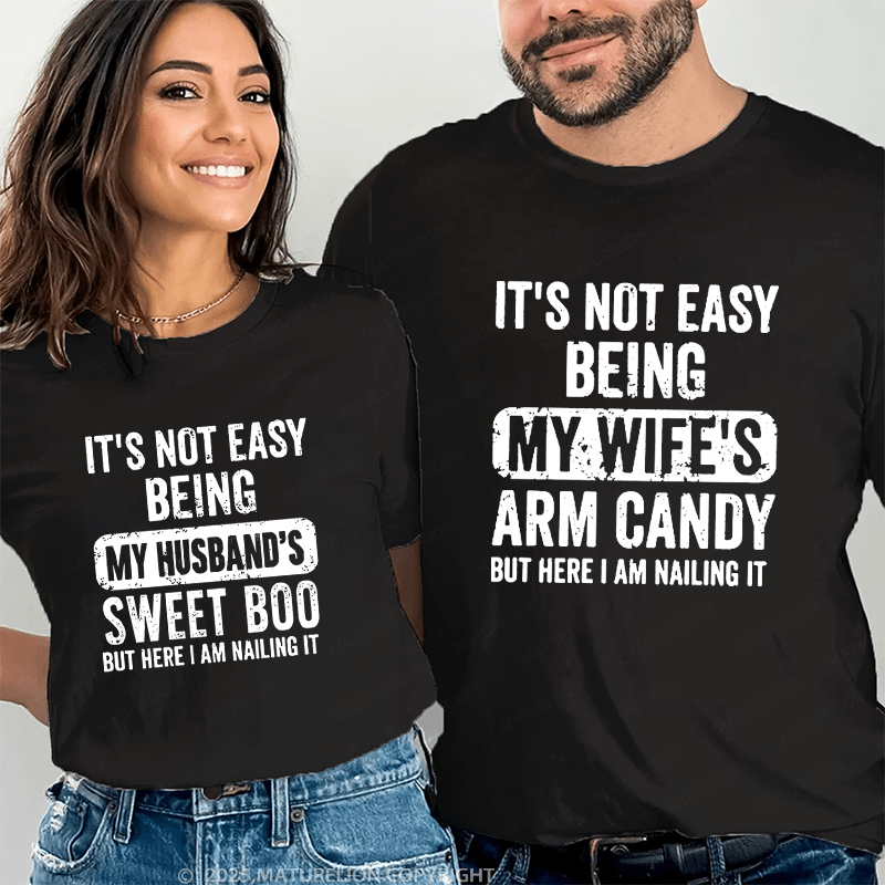 Maturelion It's Not Easy Being My Wife's Arm Candy But Here I Am Nailing It Couple T-Shirt