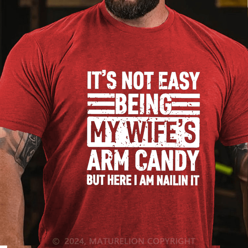 Maturelion It's Not Easy Being My Wife's Arm Candy But Here I'm Nailing It Cotton T-shirt