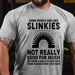 Some People Are Like Slinkies Not Really Good For Much Cotton T-shirt